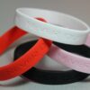 Never Quit Motivational Silicone Bracelet, debossed white - Image 3
