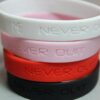 Never Quit Motivational Silicone Bracelet, debossed white - Image 2
