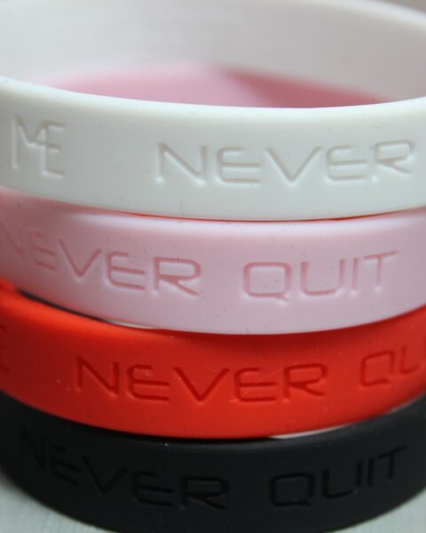 Never Quit Motivational Silicone Bracelet, debossed white