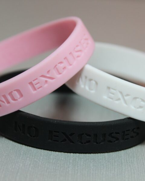 No Excuses Motivational Silicone Bracelet, debossed pink